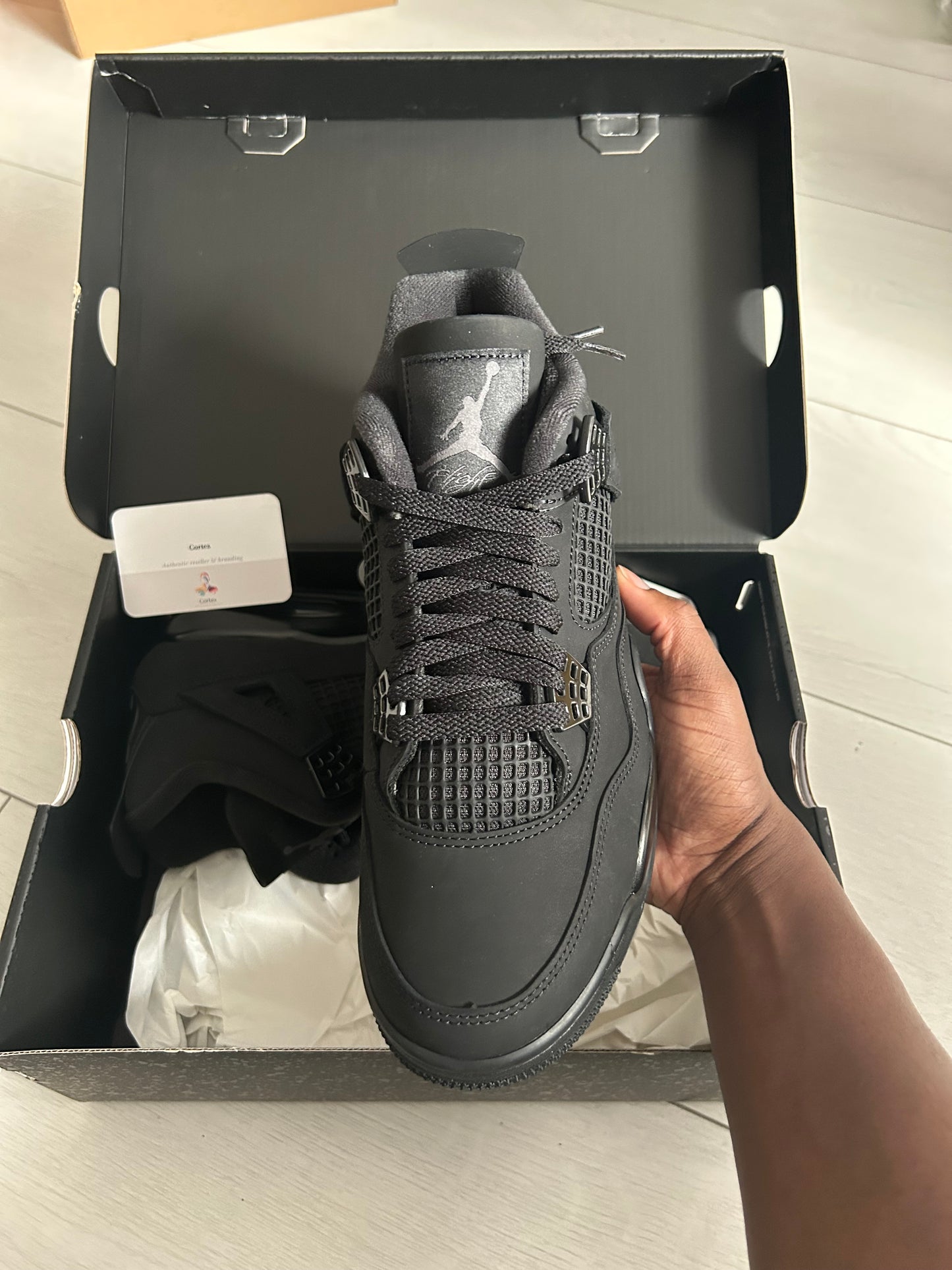 Jordan 4 black cat